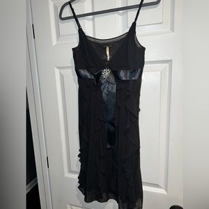 bcbgmaxazria size 4 black dress with adjustable straps and zipper on the side